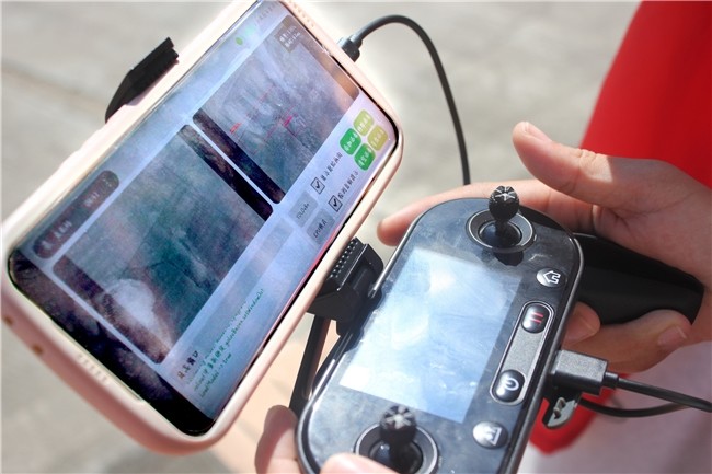 yl6809永利官网学子沿沙溪河畔开展道路智能巡检实践